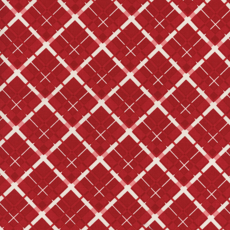 large plaid-patterned fabric in shades of red and white