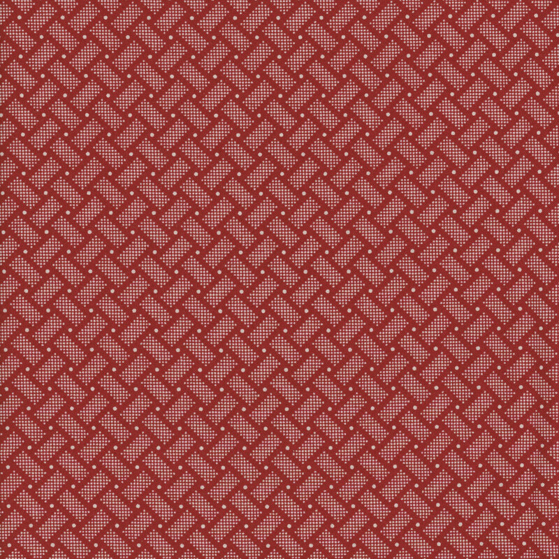 Red fabric with a white domino and dot pattern 