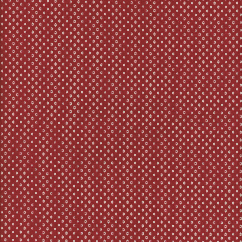 Red fabric with a white and blue star pattern 