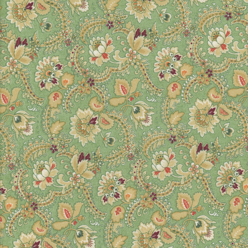 Green fabric with a floral vine pattern