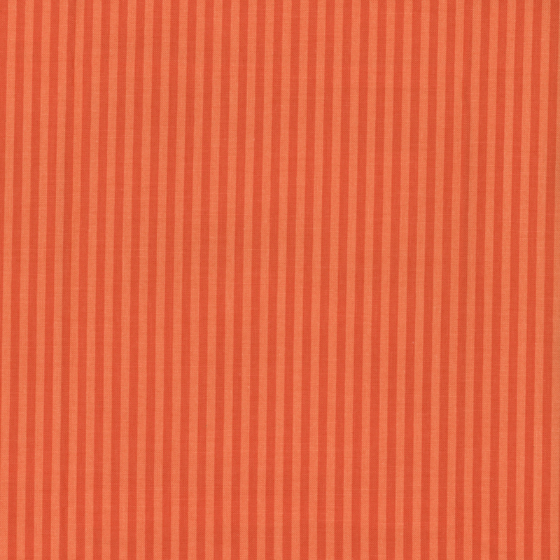 Tonal orange striped fabric with 1/8