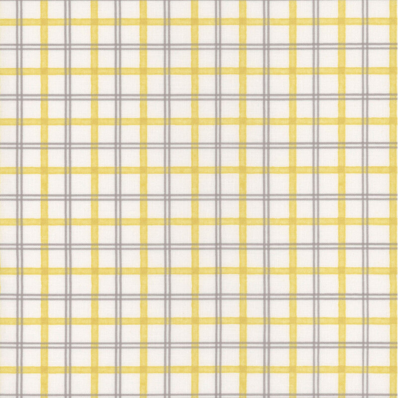 White fabric with a gray and yellow plaid pattern