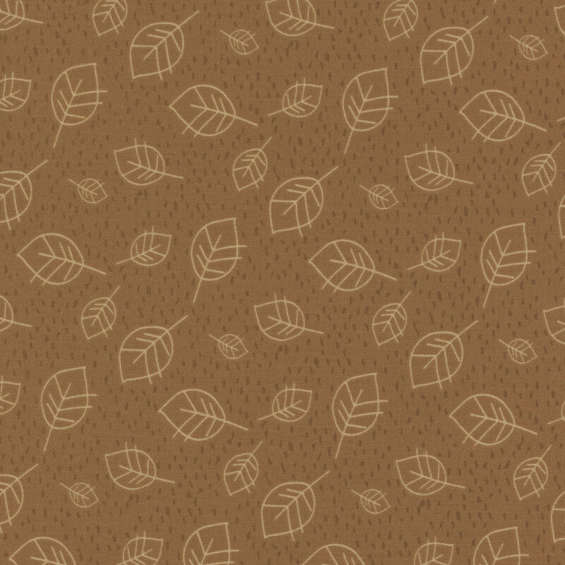 Tonal brown fabric with tan outlines of ditsy leaves and small dark brown spots in the background