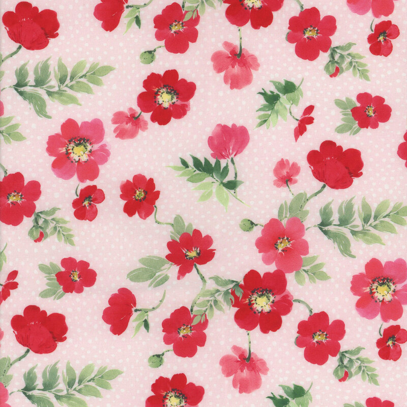 Pink fabric with red florals and green leaves throughout