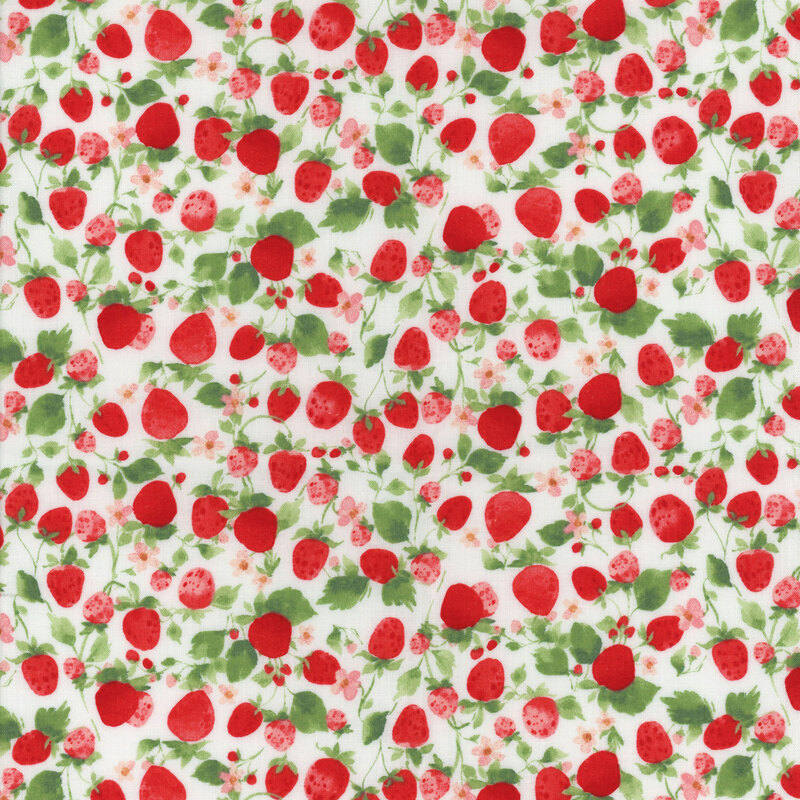 White fabric covered in red strawberries with green leaves