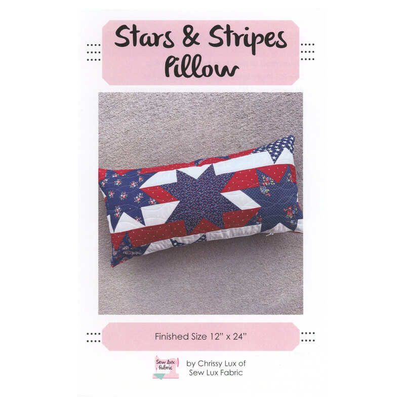 Front cover of the Stars & Stripes Pillow pattern showing the finished pillow on a concrete background.