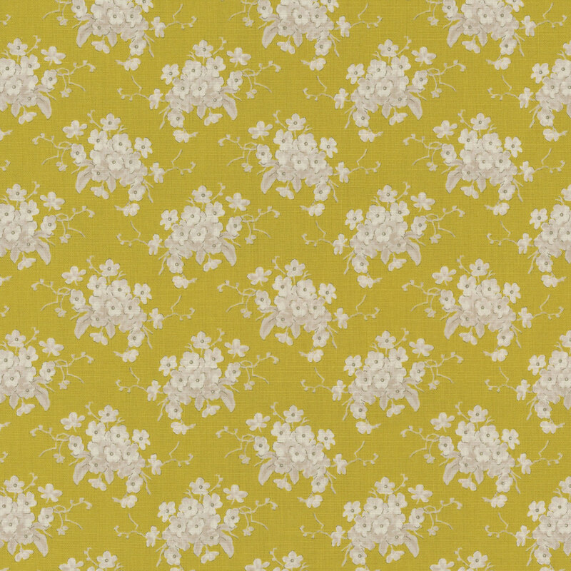 Chartreuse fabric with clusters of cream floral bouquets.