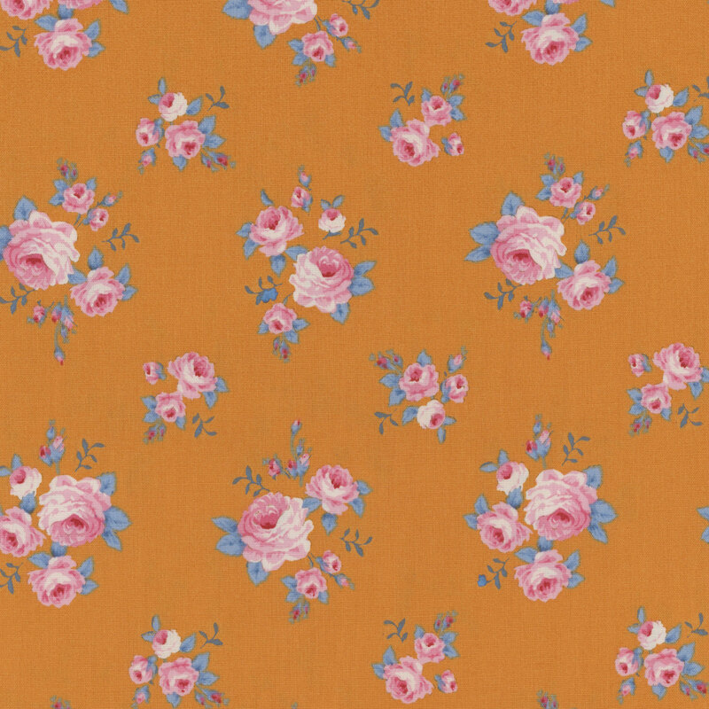 Orange fabric with tossed pink roses and rosebuds with blue leaves.