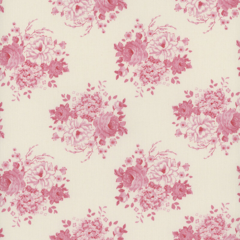 Cream fabric with clusters of pink floral bouquets.