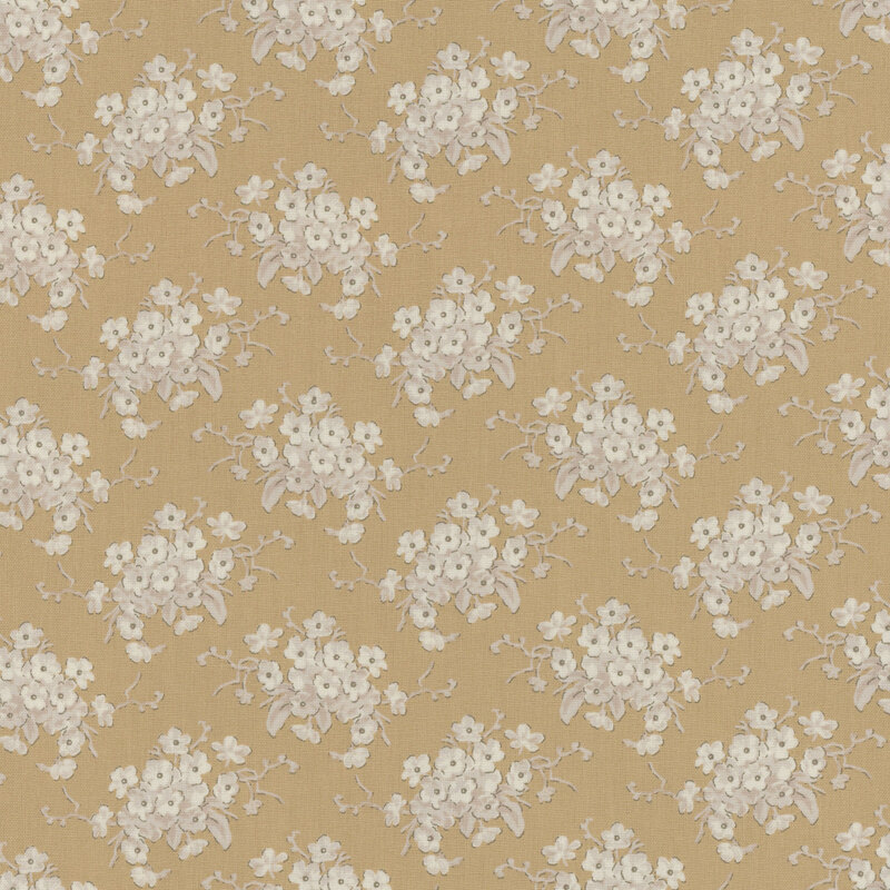 Sandy brown fabric with clusters of cream floral bouquets.