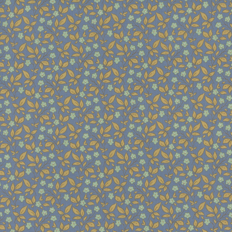 Denim blue fabric with a tossed mint floral and brown leaf pattern.