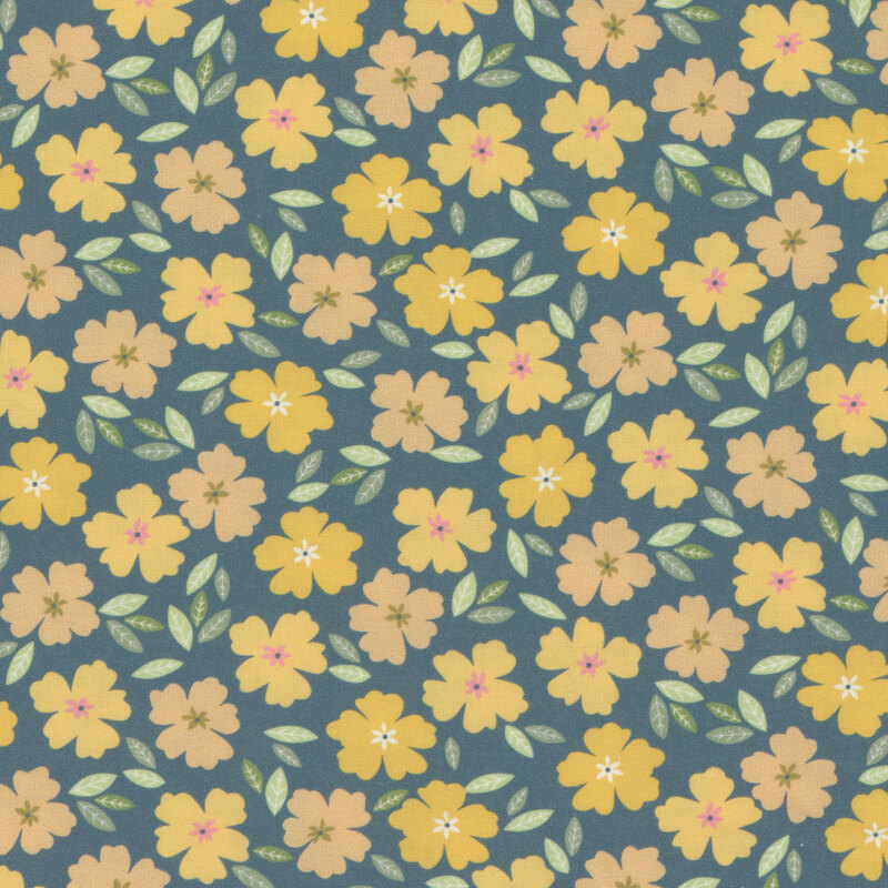 Blue fabric with yellow and pink flowers with scattered leaves.