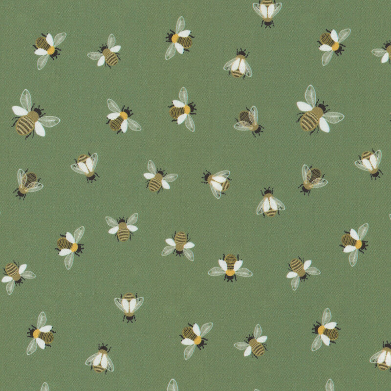 Olive green fabric with scattered bees flying and in place from a top-down view.