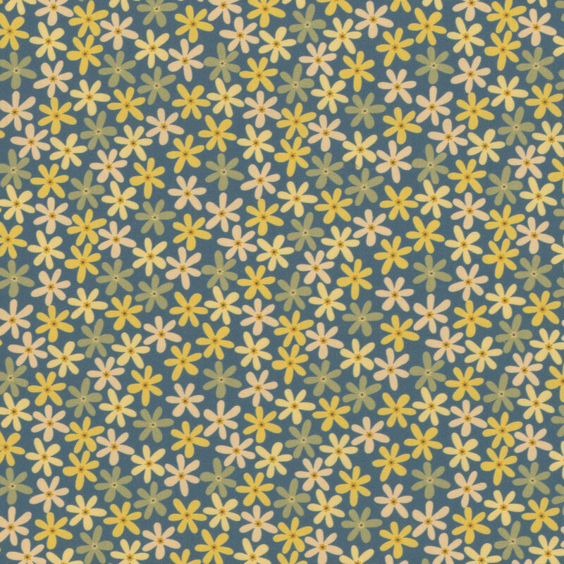 Blue fabric nearly completely covered in yellow and pink daisies.