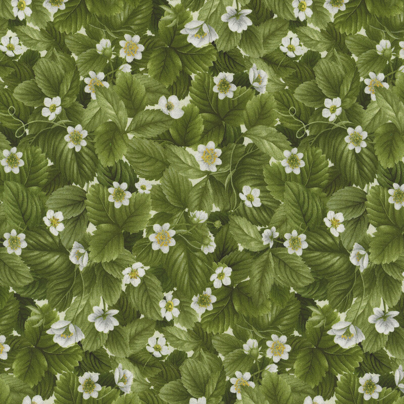 Fabric featuring packed green photorealistic strawberry leaves and white florals throughout