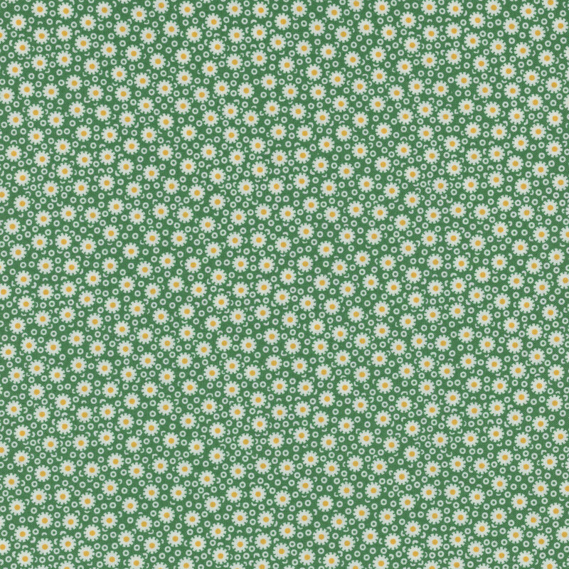 Green fabric with simplified daisies on a background of small, thick circles.