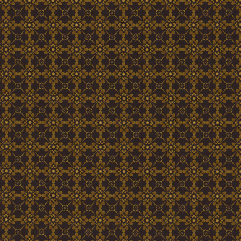 Black fabric with a gold geometric flower pattern.