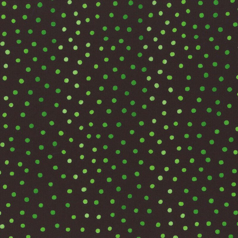 Black fabric featuring dots in various shades of green