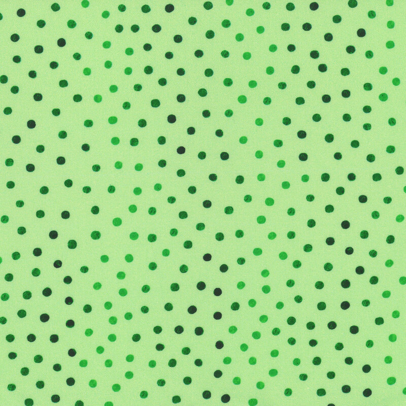 Light green fabric featuring dots in various shades of green