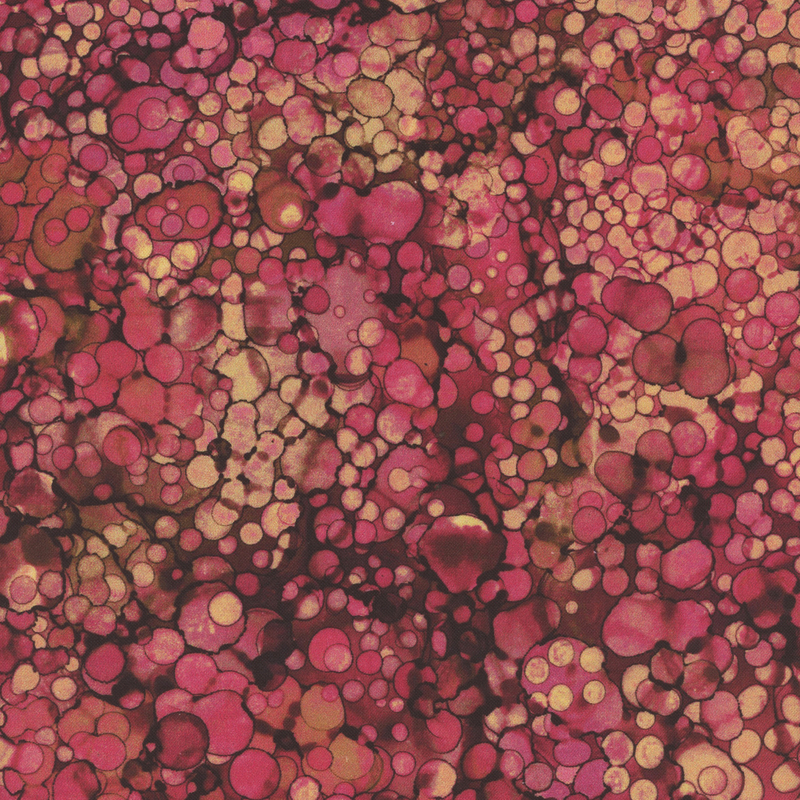 Magenta, dark pink, and burnt sienna marbled fabric with small dots all over