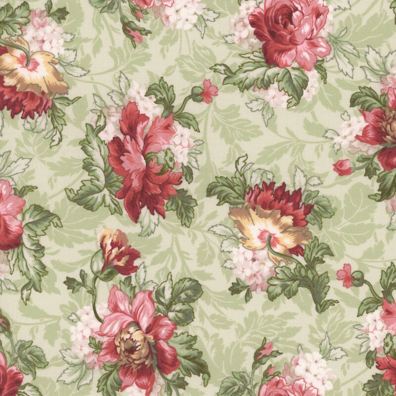 A swatch of green fabric with large multicolored roses and long leafy stems on a tonal shadowed background.