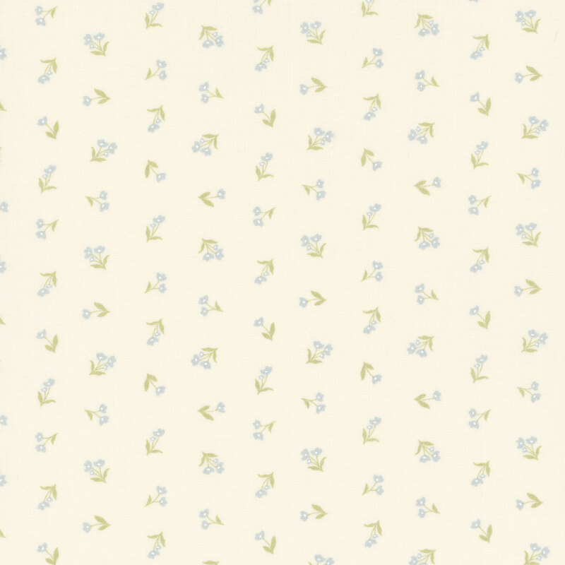 Off white fabric with small, blue flowers with green stems in a ditsy pattern