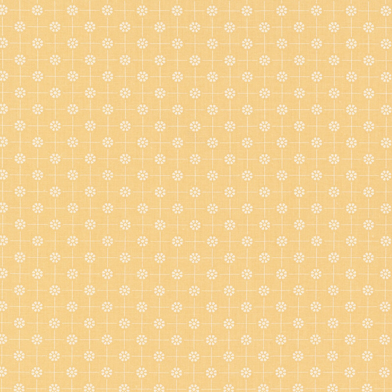 Pale yellow fabric with white dotted florals arranged in a polka dot pattern connected by thin lines