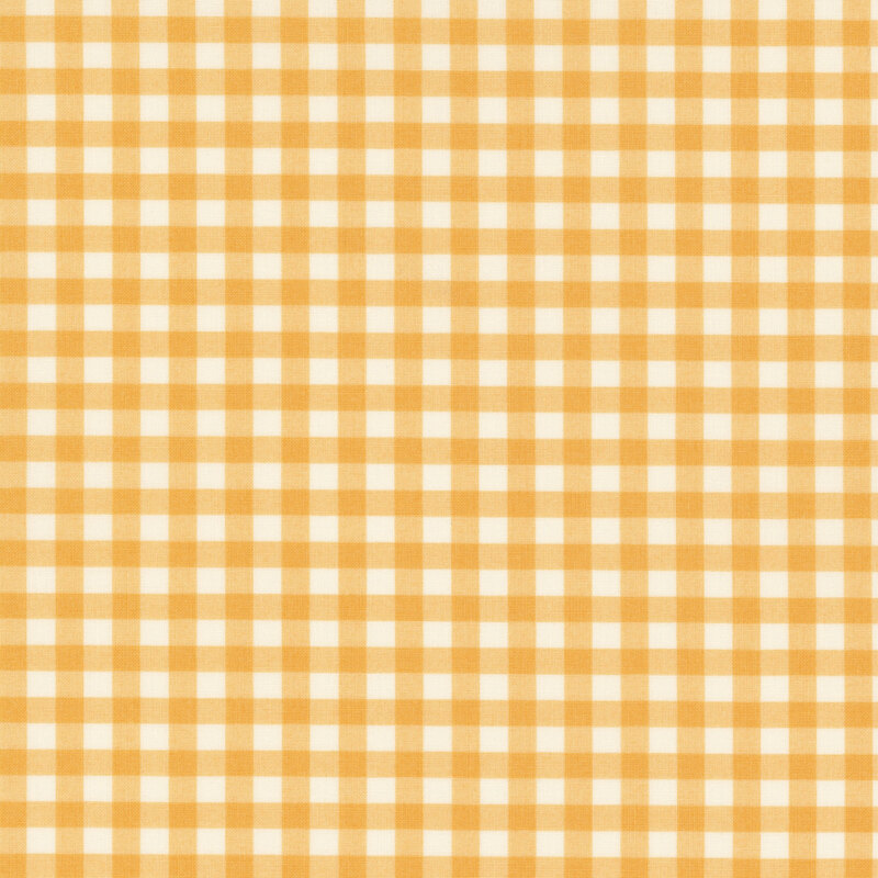 White fabric with a golden gingham pattern