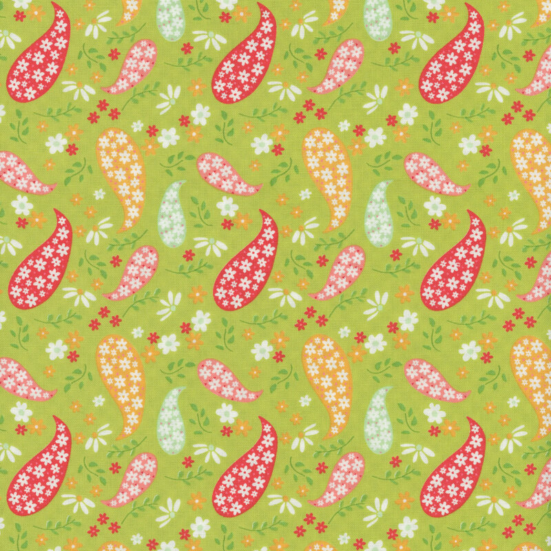 Lime green fabric with tossed multicolor paisley designs with small flowers scattered between.