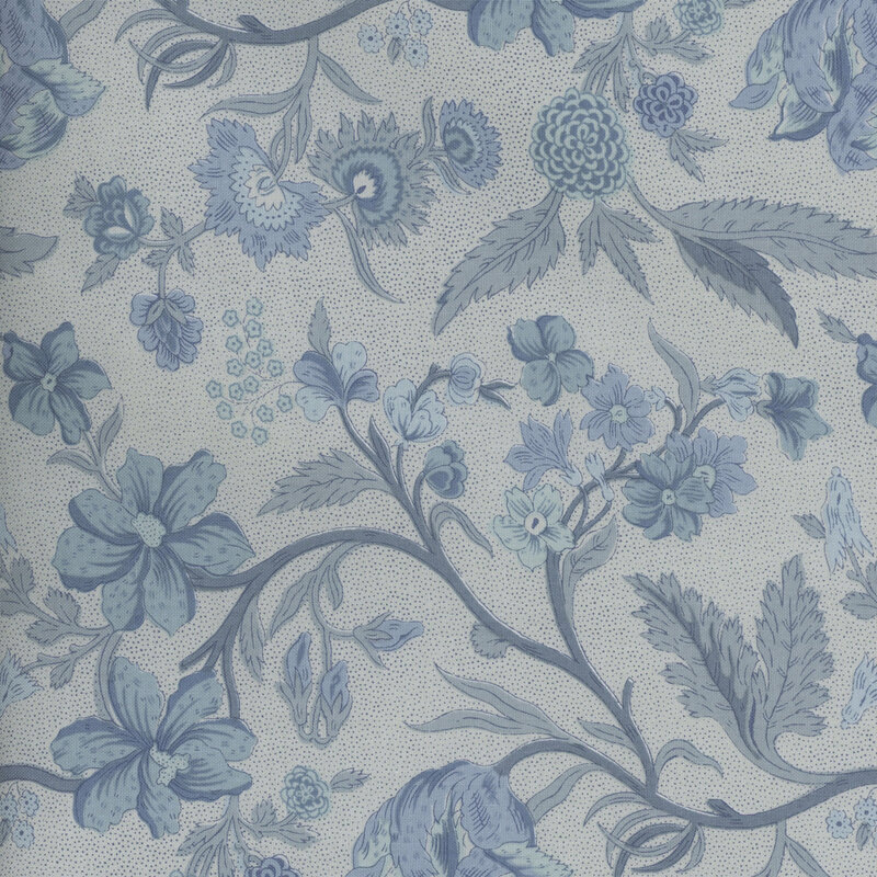 Tonal blue fabric featuring sprawling vines with leaves and flowers