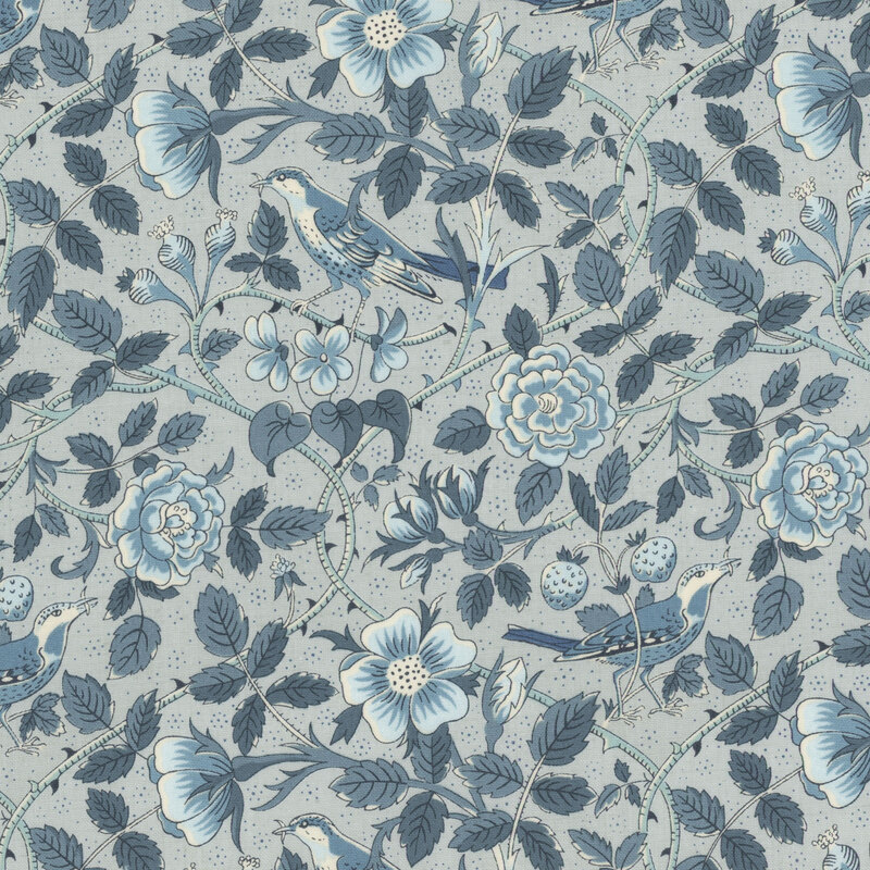 Light blue fabric featuring birds amidst the sprawling vines and blooming flowers 