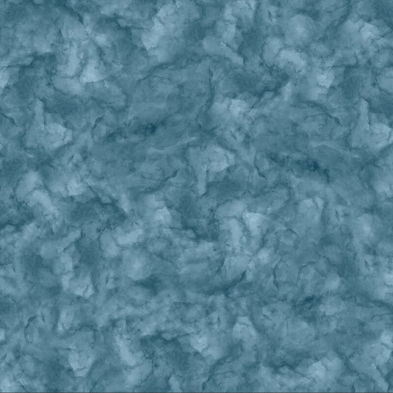 Teal fabric with a mottled design