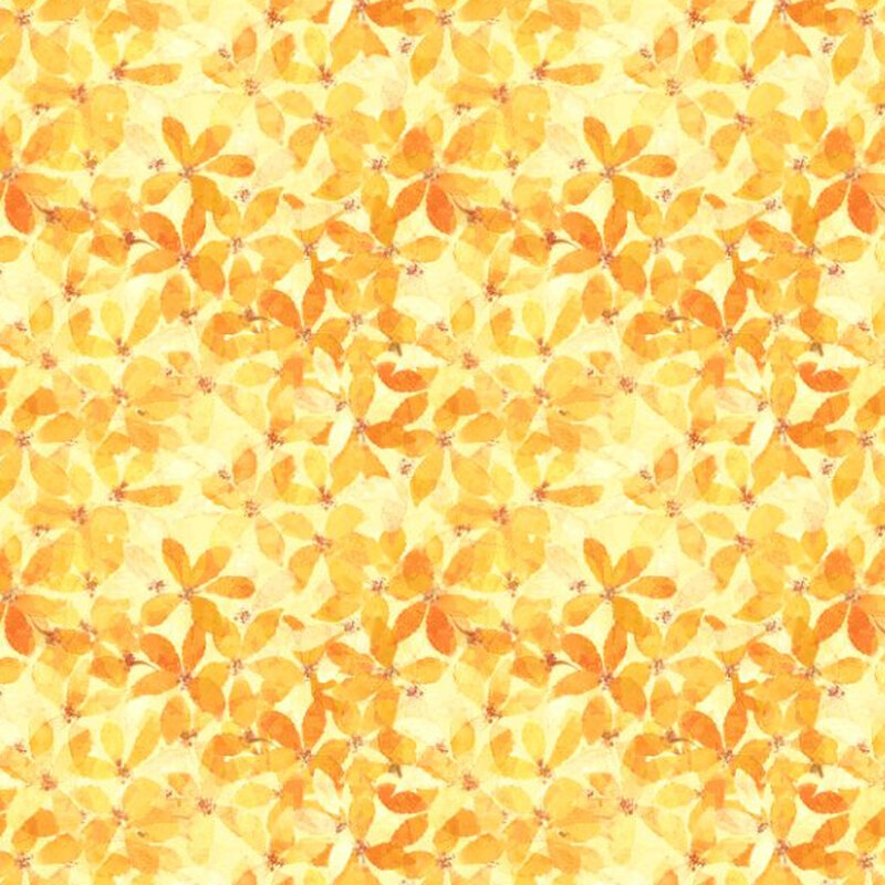 Yellow fabric covered in light yellow and orange florals