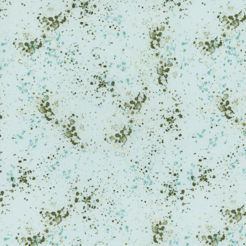 Light aqua fabric with green splatters throughout