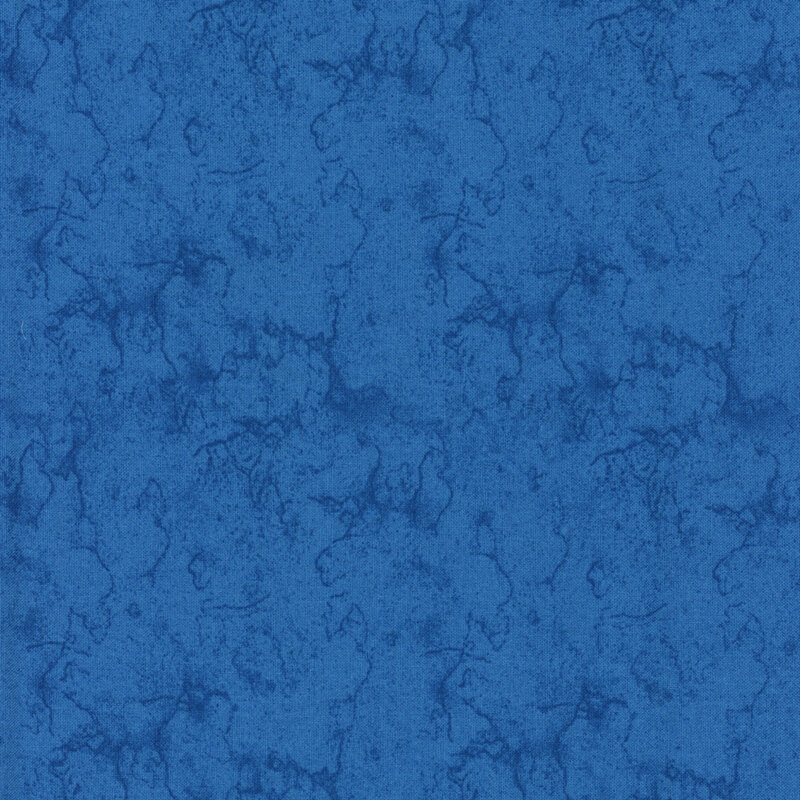 Blue fabric with a tonal, cracked, distressed look