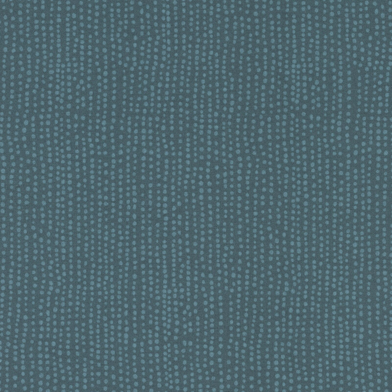 Ocean blue fabric with small tonal dots all over.