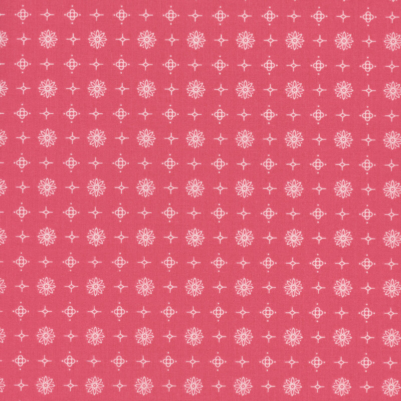 Pink fabric with small, white, evenly spaced flowers and stars throughout