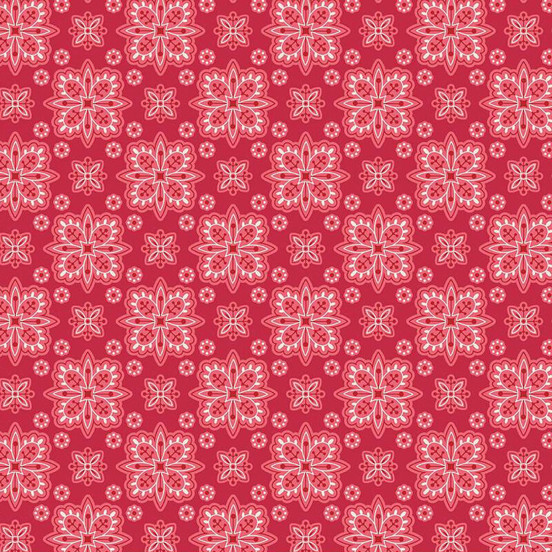 Barn red fabric with geometric floral shapes creating a checker-like pattern