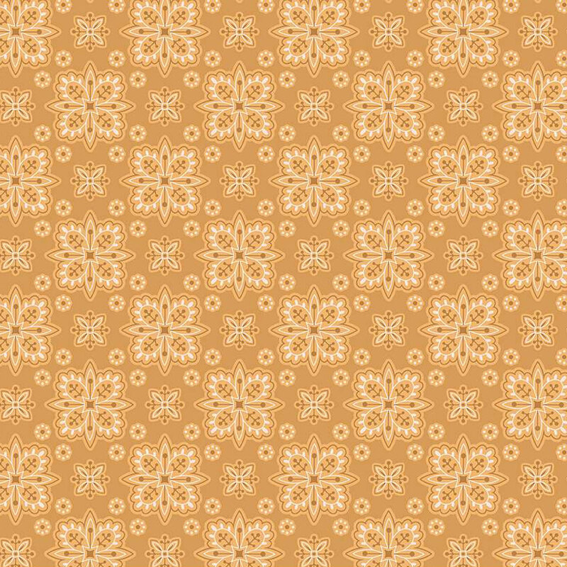 Caramel-colored fabric with geometric floral shapes creating a checkered-like pattern