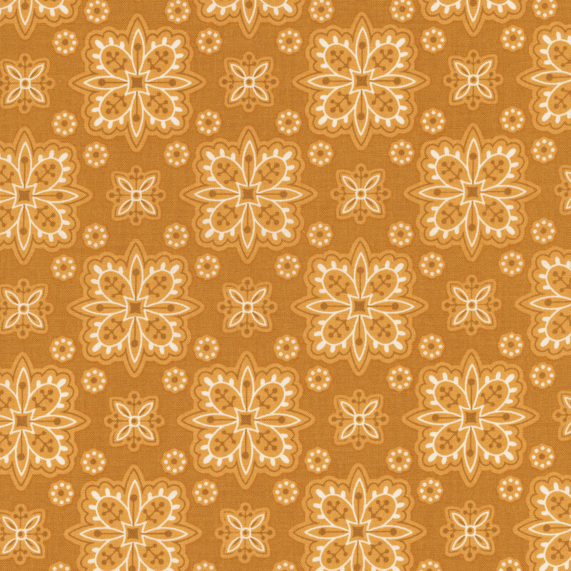 Caramel-colored fabric with geometric floral shapes creating a checkered-like pattern