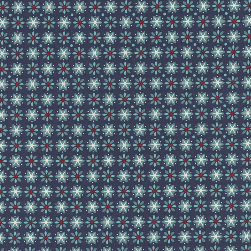 Denim blue fabric featuring small red, white, and light blue stars and flowers in alternating patterns