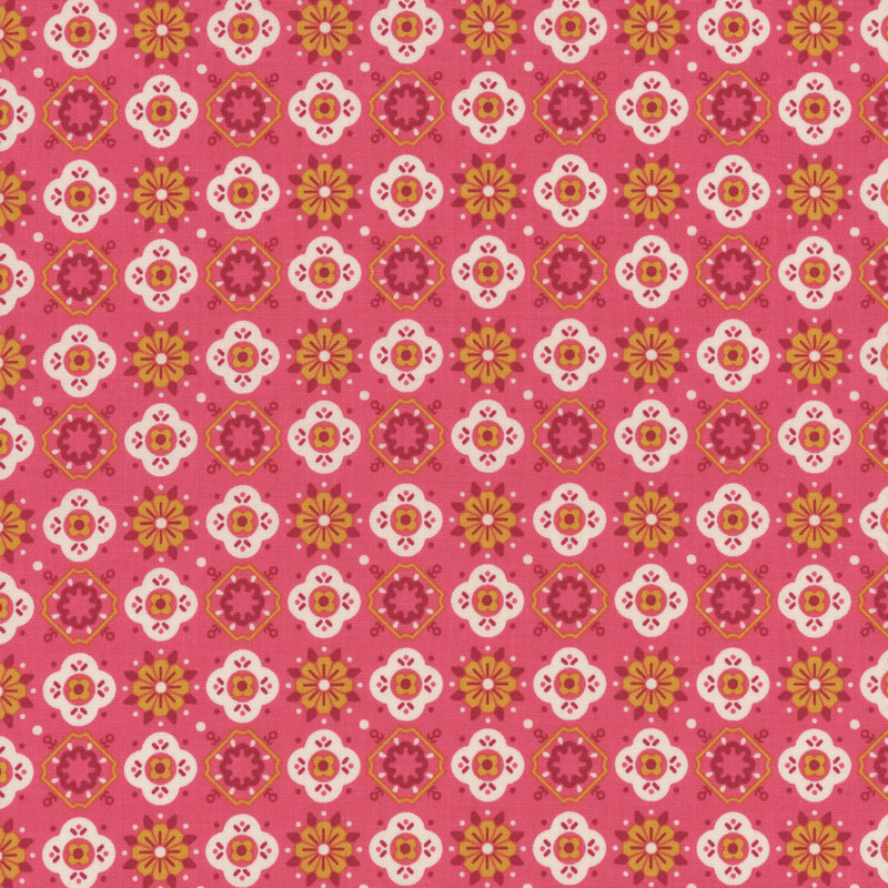 Pink fabric featuring alternating geometric floral shapes in white, red, and yellow