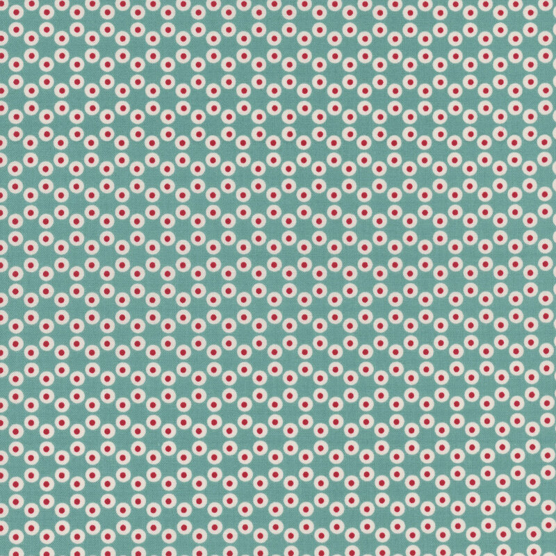 Teal fabric with a connected hexagon pattern made of small white circles with red dot centers