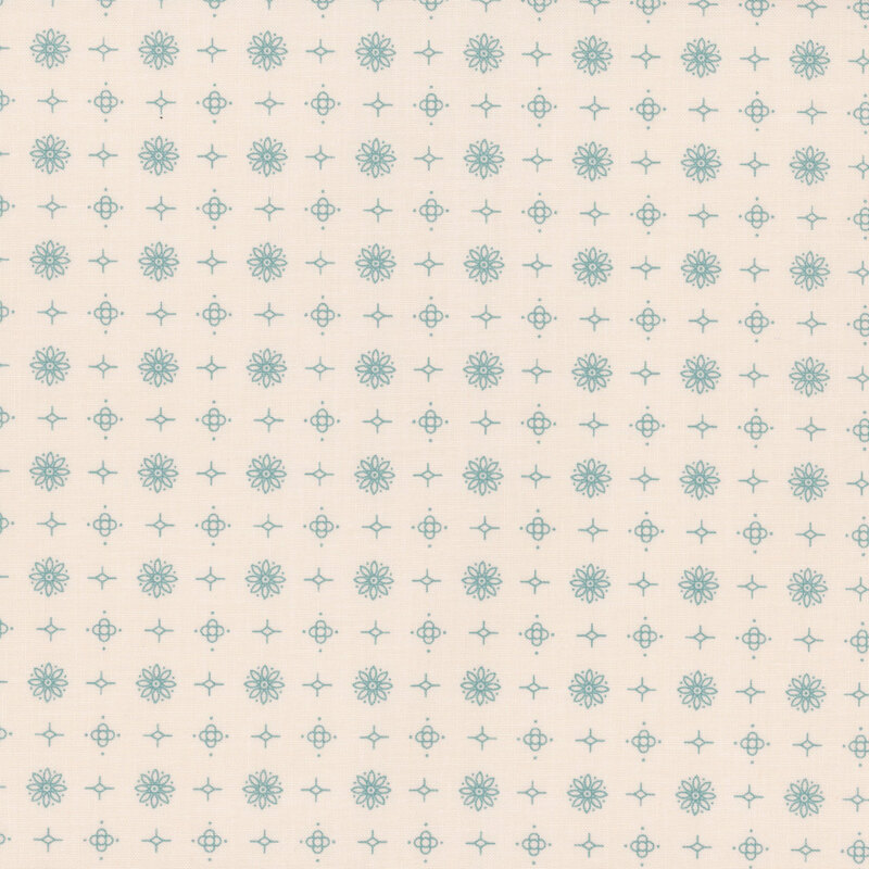 Off white fabric with evenly spaced blue flowers, diamond shaped flowers, and small stars