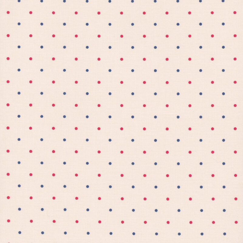 Beige fabric with red and blue alternating polka dots throughout