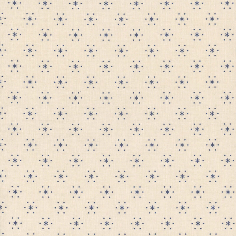 Off white fabric with small, blue, evenly spaced stars that are surrounded by little white polka dots