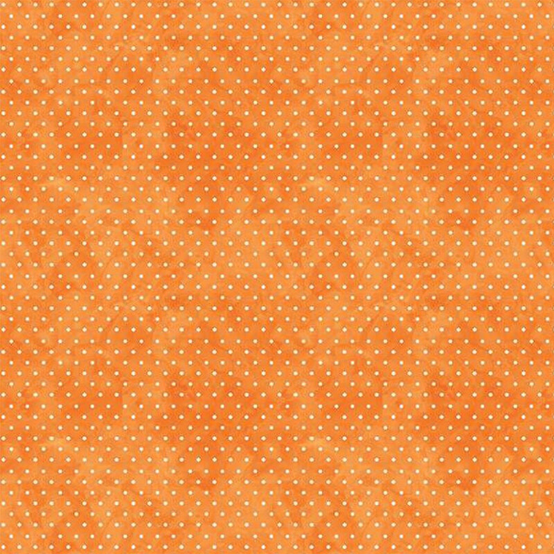 Mottled vivid orange fabric with a white polka dot pattern