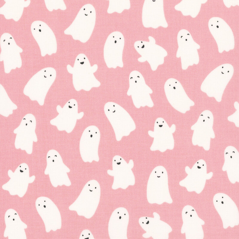 Pink fabric with smiling blobby ghosts.