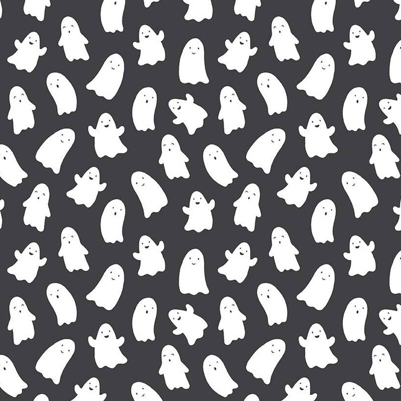 Black fabric with smiling blobby ghosts.