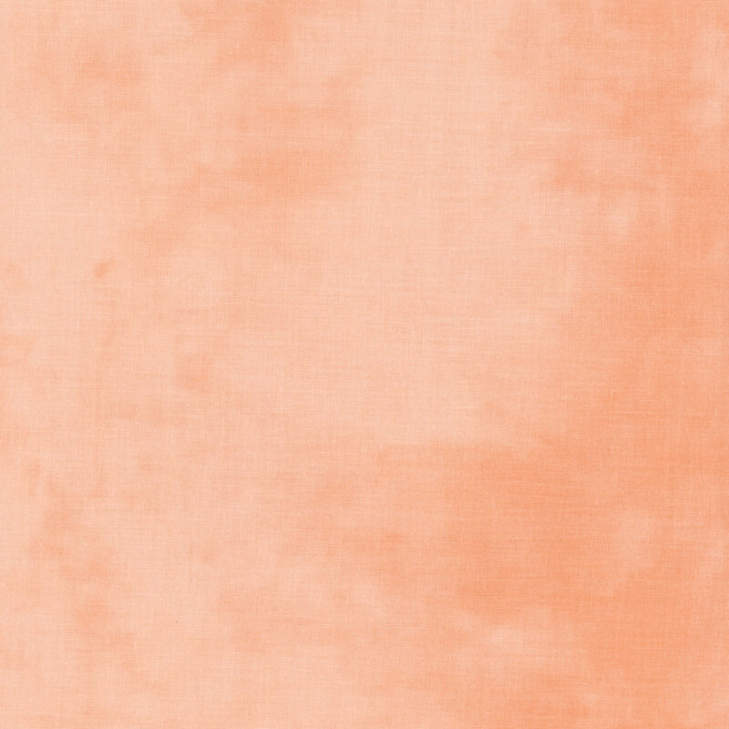 Mottled coral pink fabric.